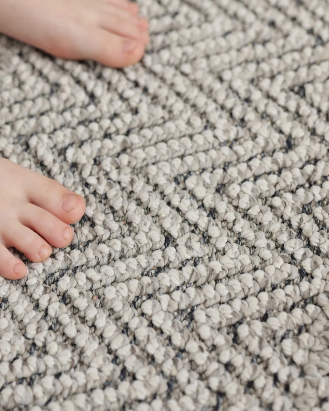 Cozy carpeted family room installed by APW Flooring