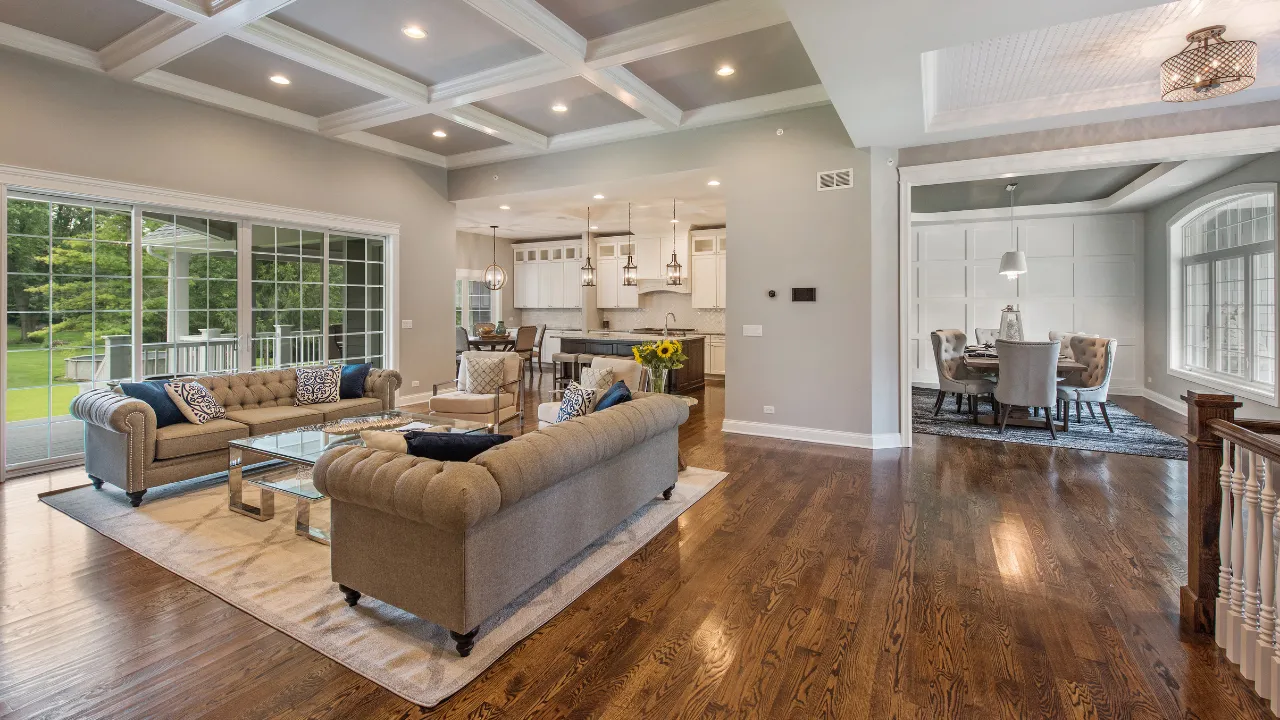 Open-concept central NC home with wide-plank hardwood flooring by APW