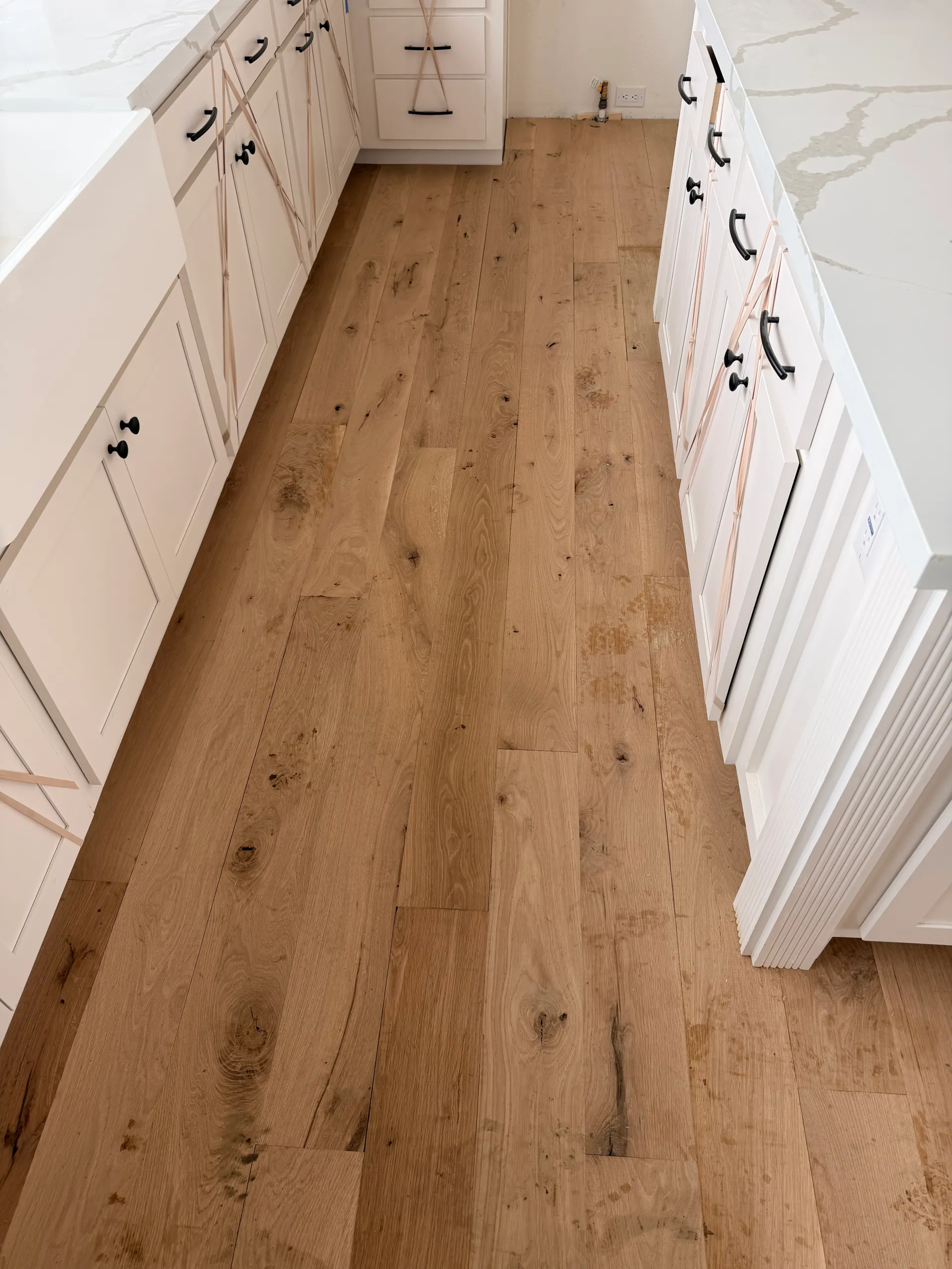 Remodeled kitchen with new flooring and cabinets in Angier, NC