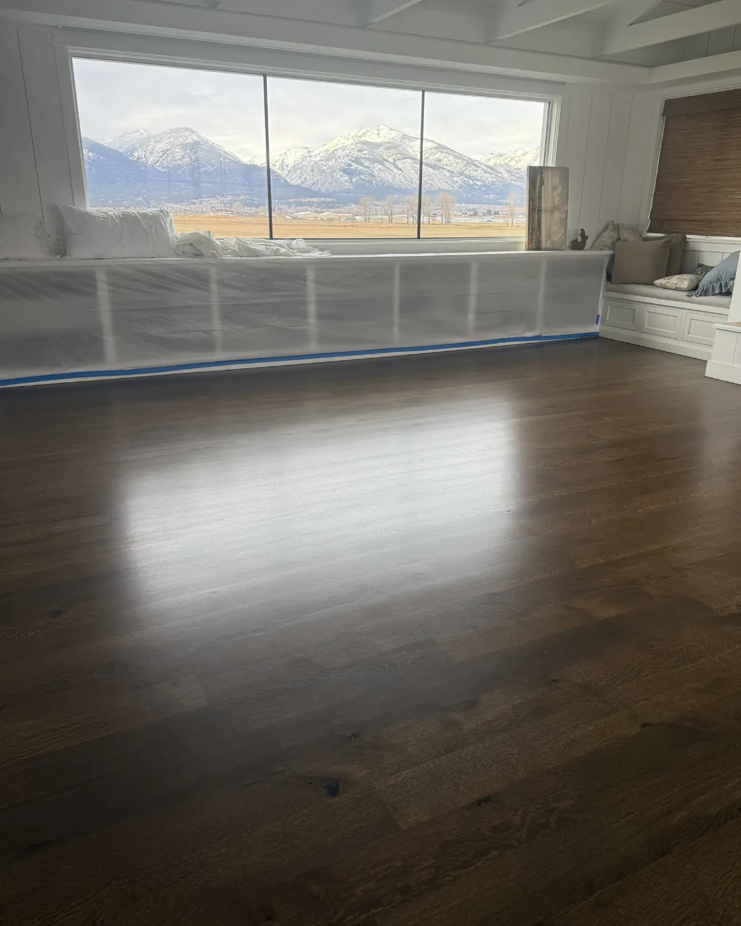 A bright, humidity-friendly living room with engineered wood flooring in a North Carolina home