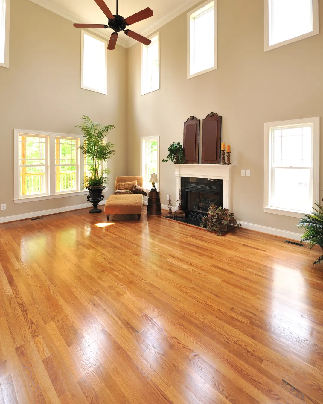 Children and parents relaxing on durable family-friendly flooring in a North Carolina home